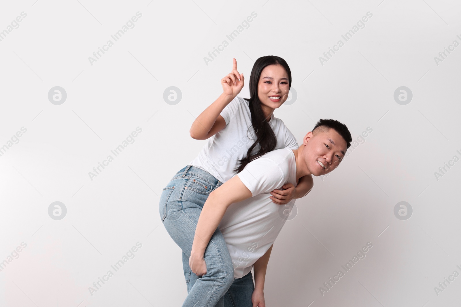 Photo of Portrait of happy couple on white background