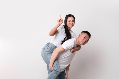 Photo of Portrait of happy couple on white background