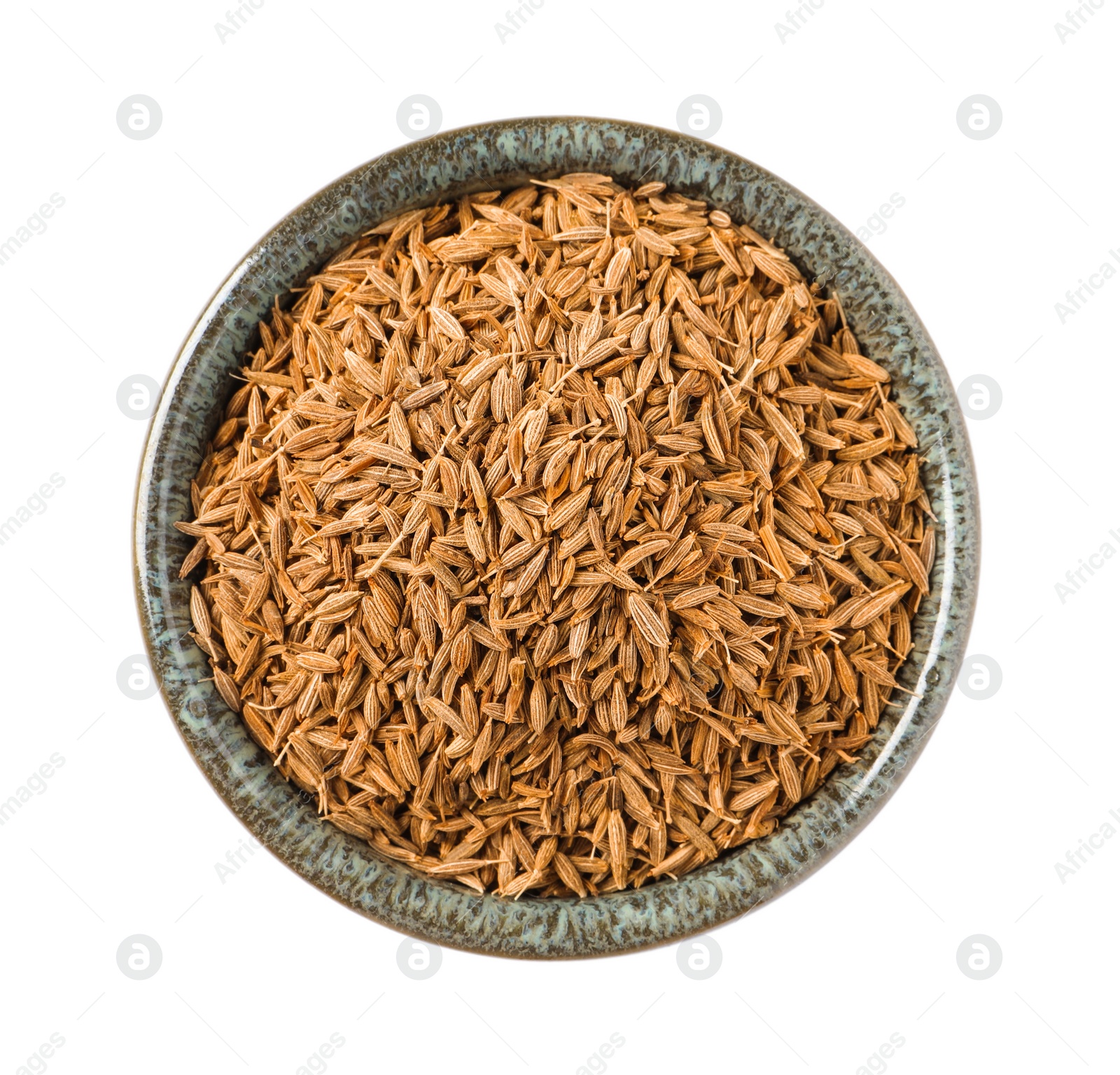 Photo of Bowl of aromatic caraway (Persian cumin) seeds isolated on white, top view