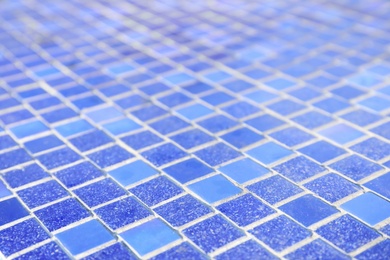 Surface covered with blue tiles as background