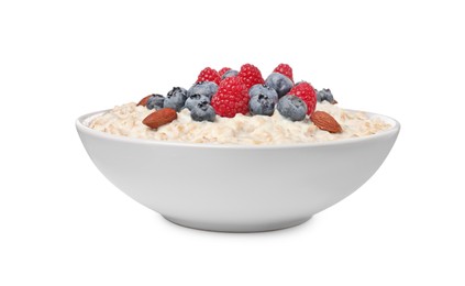 Photo of Tasty boiled oatmeal with berries and almonds in bowl isolated on white