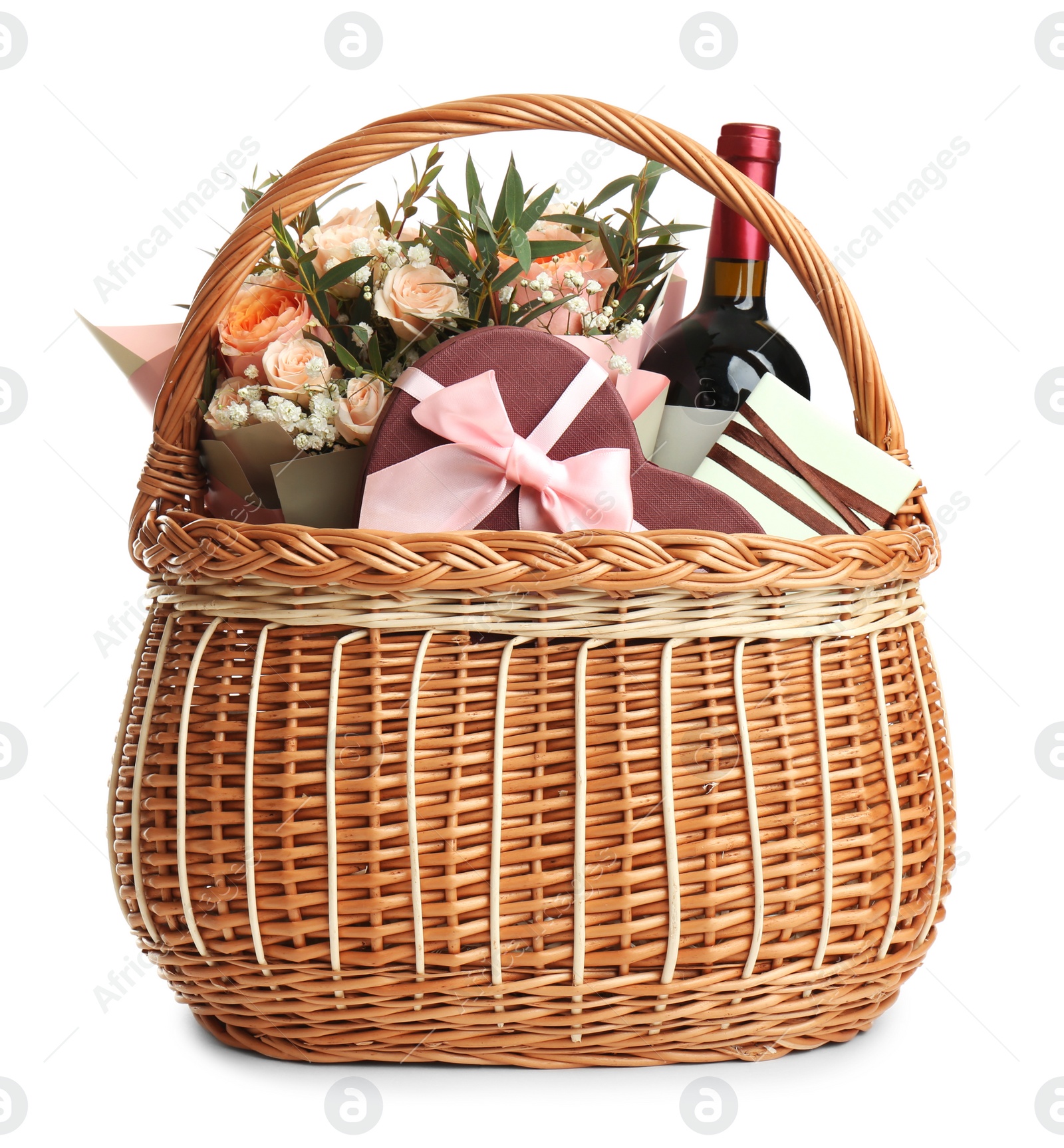 Photo of Wicker basket with different gifts on white background
