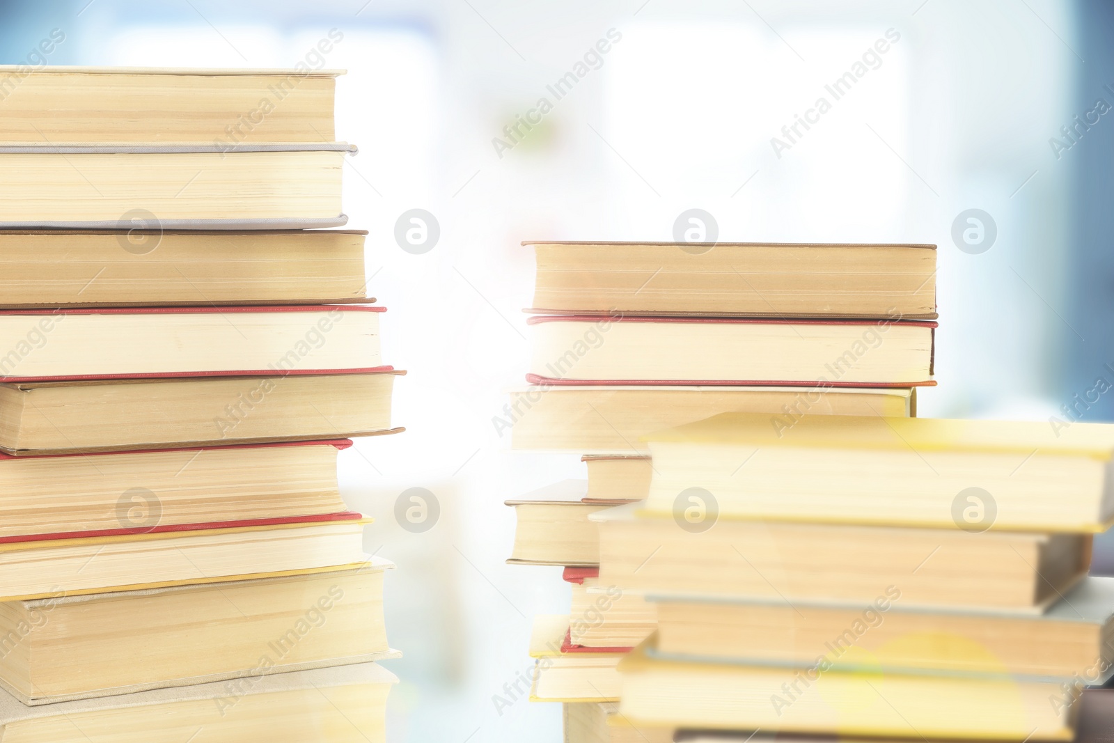 Image of Stacks of books indoors. Bokeh effect 