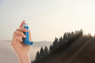 Image of Woman with asthma inhaler and beautiful mountains on background, closeup. First emergency medical aid