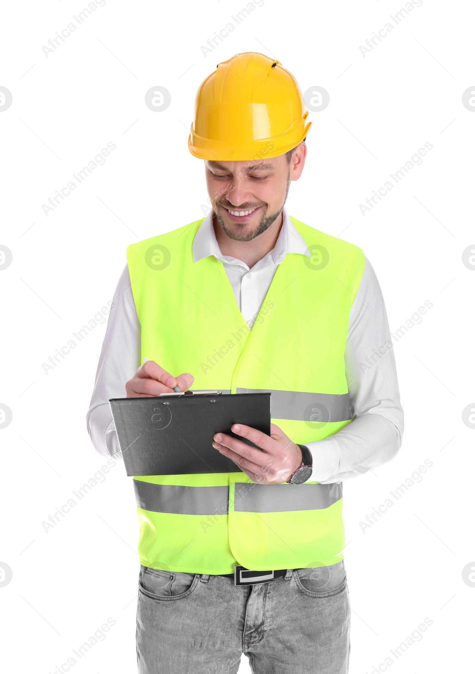 Photo of Male industrial engineer in uniform with clipboard on white background. Safety equipment