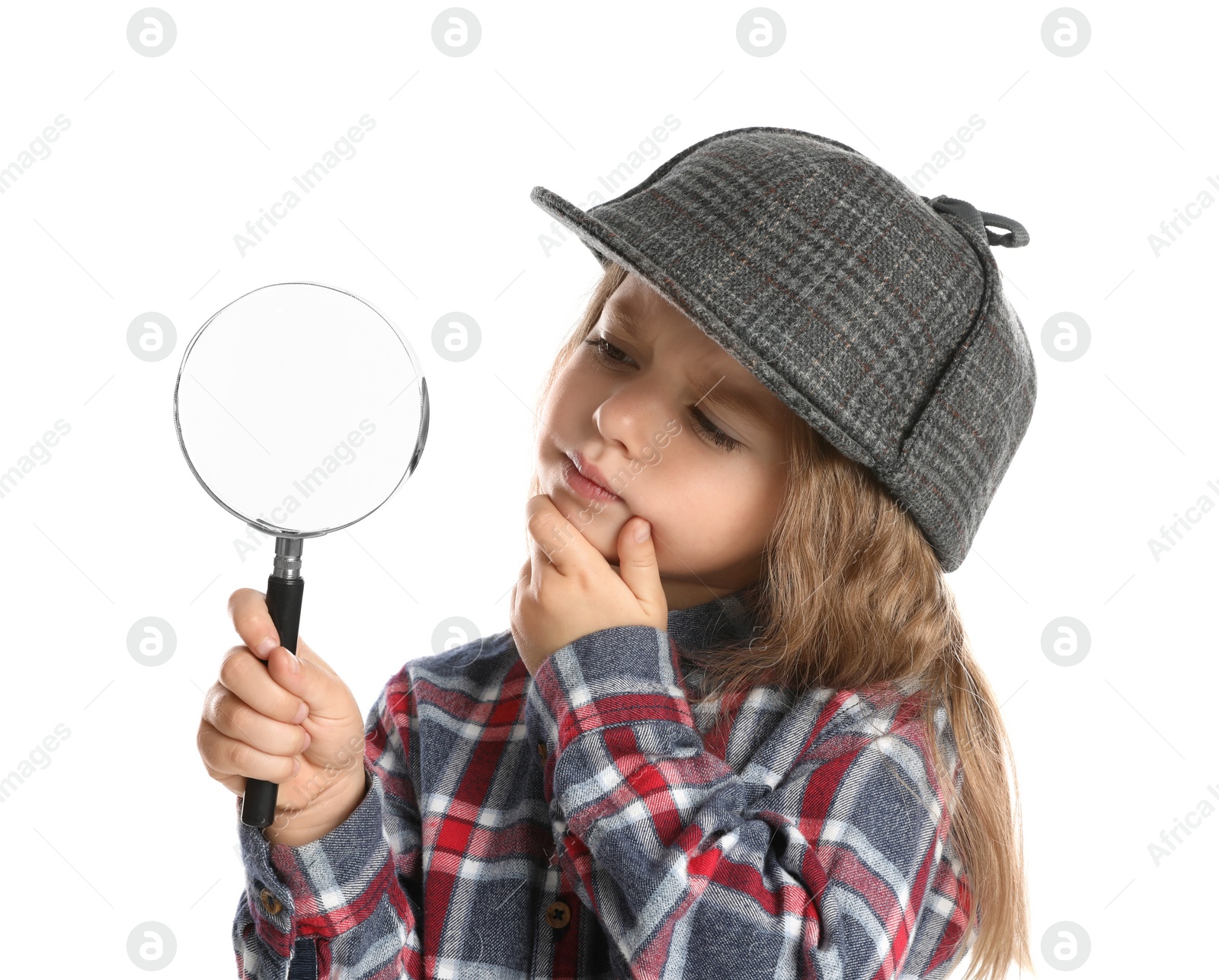 Photo of Cute little child in hat with magnifying glass playing detective on white background