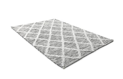 Photo of Stylish grey rug isolated on white. Interior accessory