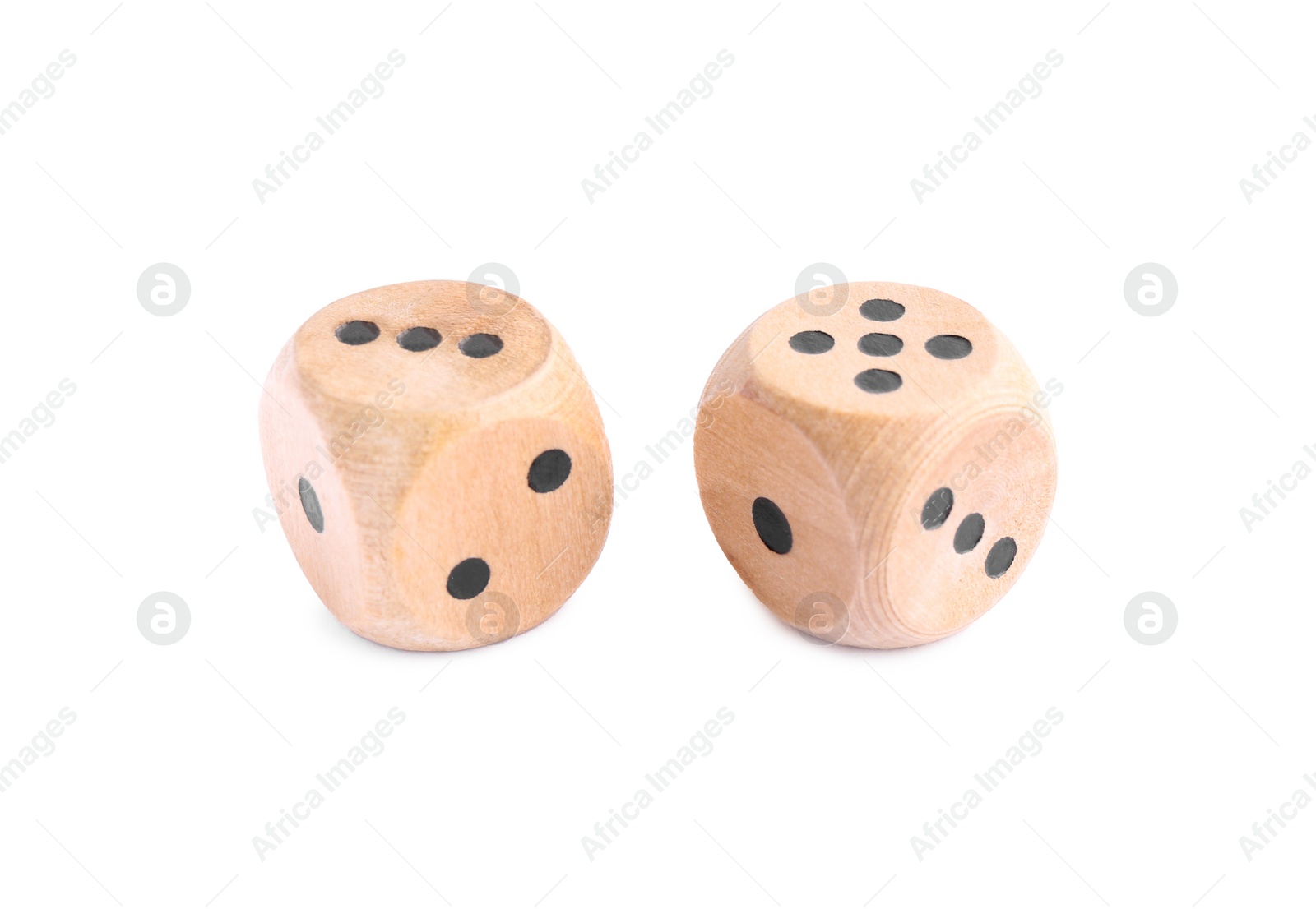 Photo of Two wooden game dices isolated on white