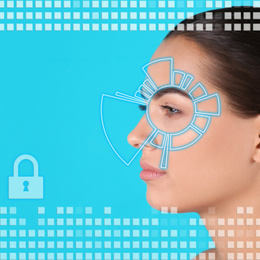 Image of Facial recognition system. Woman scanned by iris on blue background