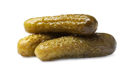 Photo of Pile of tasty pickled cucumbers isolated on white