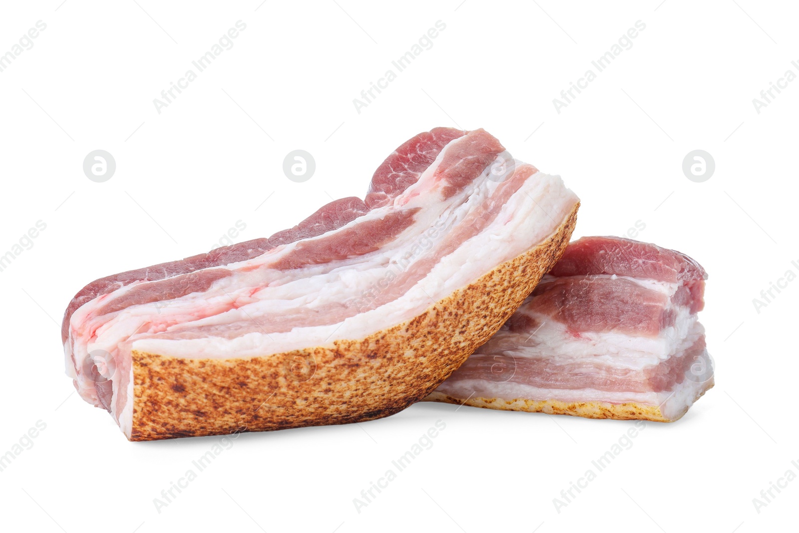 Photo of Pieces of raw pork belly isolated on white