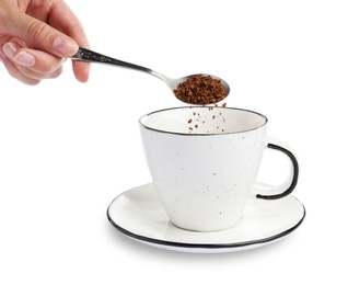 Photo of Woman pouring instant coffee into cup on white background, closeup