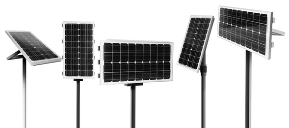 Set with different solar panels on white background, banner design. Alternative energy source 