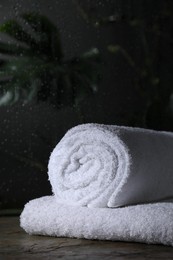 White terry towels on table in bathroom