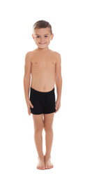 Photo of Cute little boy in underwear on white background