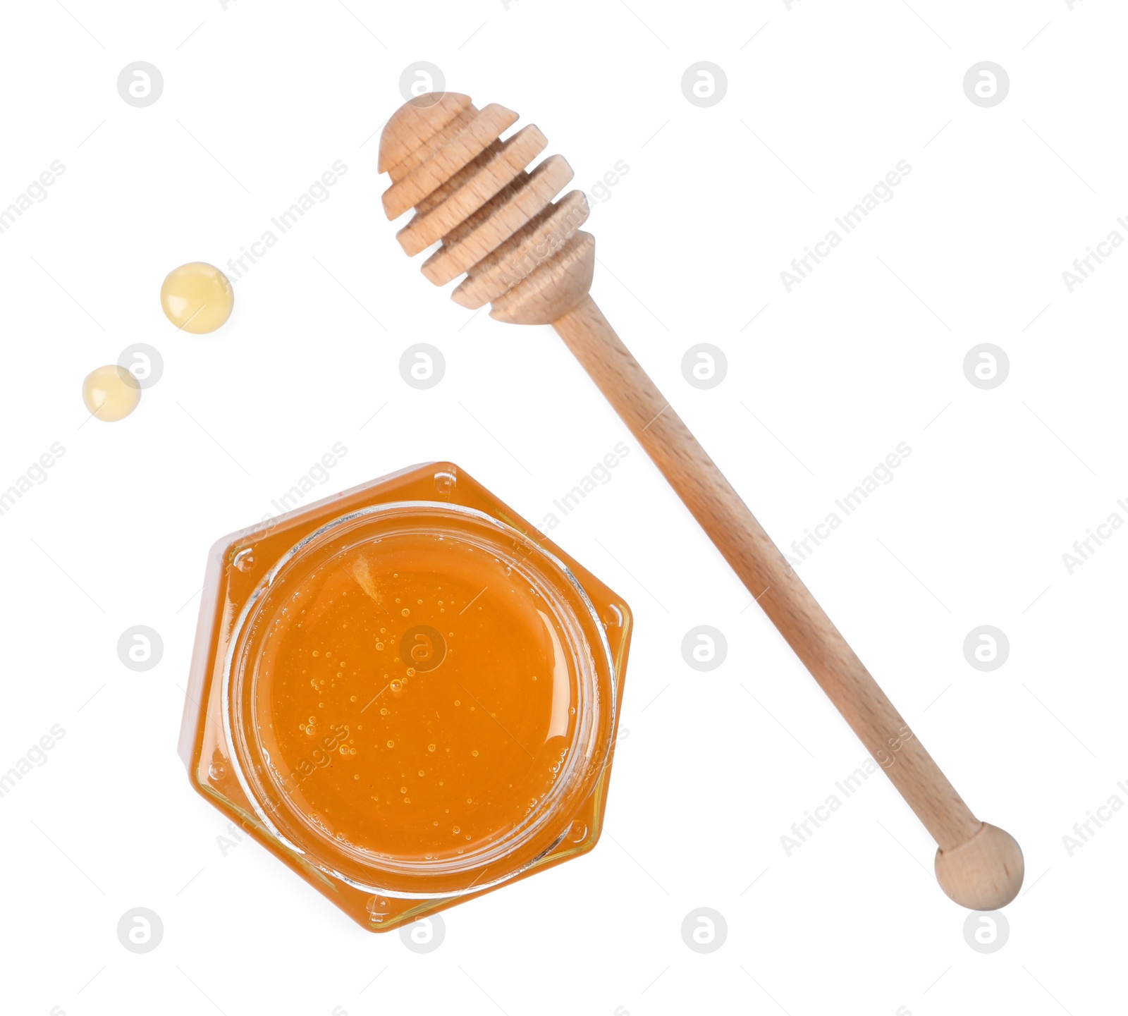 Photo of Tasty honey in glass jar and dipper isolated on white, top view. Space for text