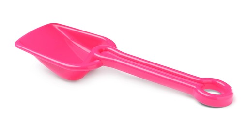 Photo of Pink plastic toy shovel isolated on white