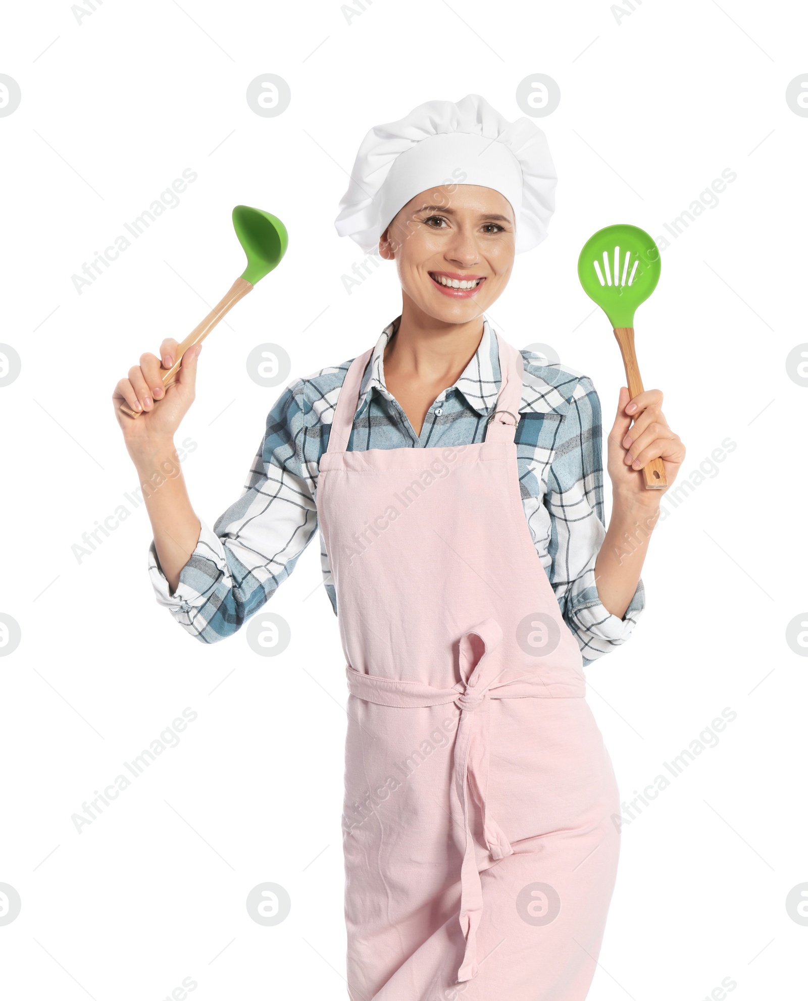 Photo of Female chef holding ladle and slotted spoon on white background