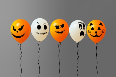 Image of Color balloons for Halloween party on gray background
