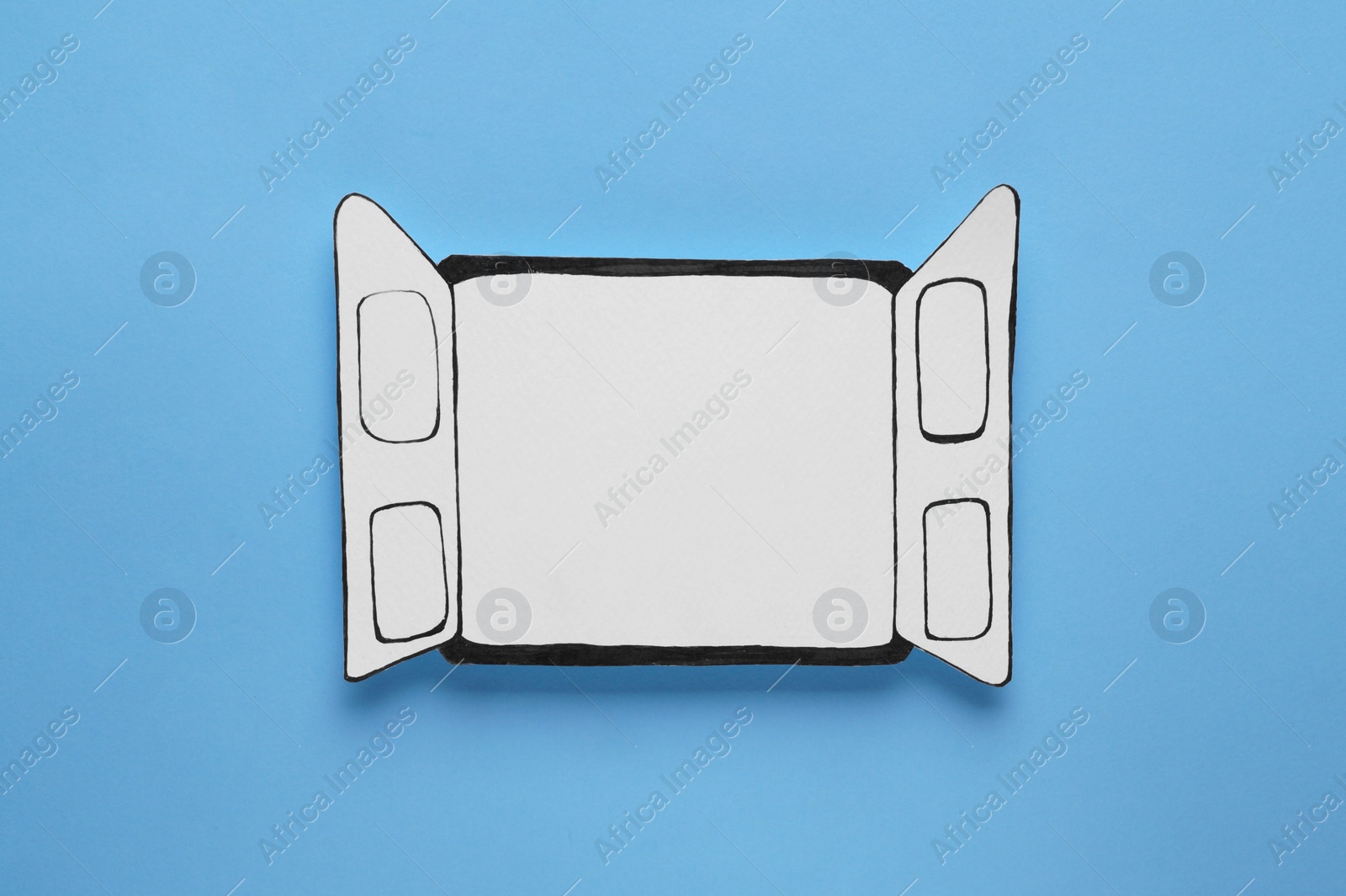 Photo of Open paper window frame on light blue background. Space for text