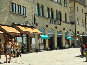 Photo of San Marino, San Marino - August 17, 2022: People walking on Via Donna Felicissima street
