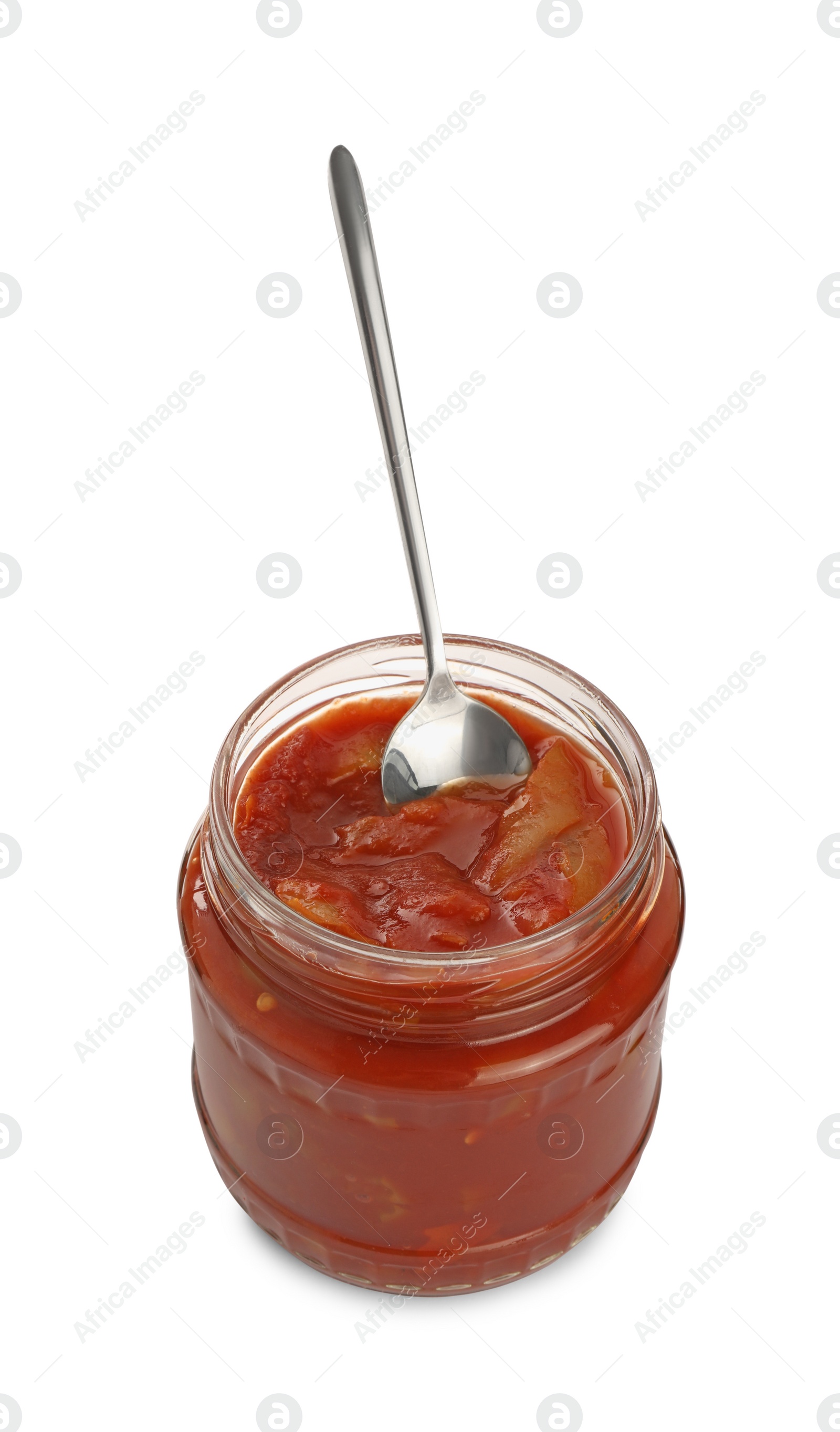 Photo of Glass jar of delicious canned lecho with spoon isolated on white