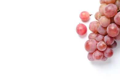 Fresh ripe red grapes on white background, top view