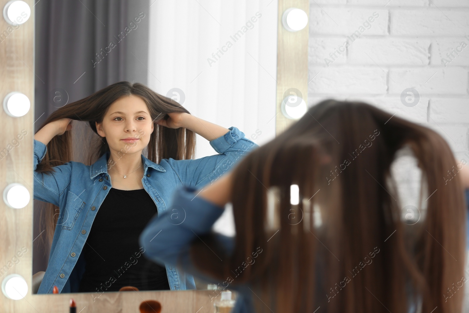 Photo of Attractive teenage girl in dressing room