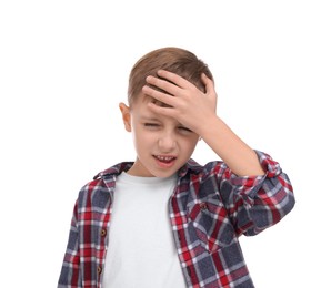 Photo of Little boy suffering from headache on white background