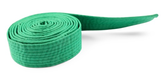 Photo of Green karate belt isolated on white. Martial arts uniform