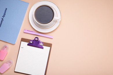 Photo of Mini clipboard with to do notes, planner, stationery and cup of coffee on beige background, flat lay. Space for text