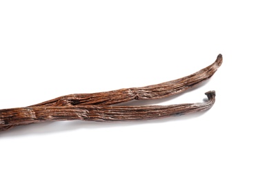 Photo of Aromatic vanilla sticks on white background