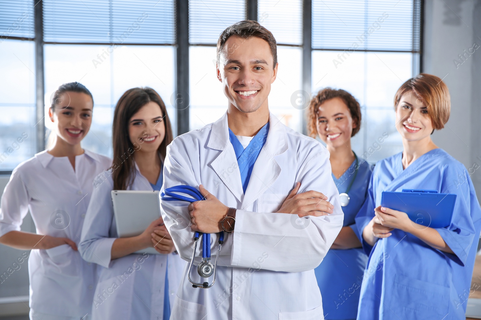 Photo of Smart medical student with his classmates in college