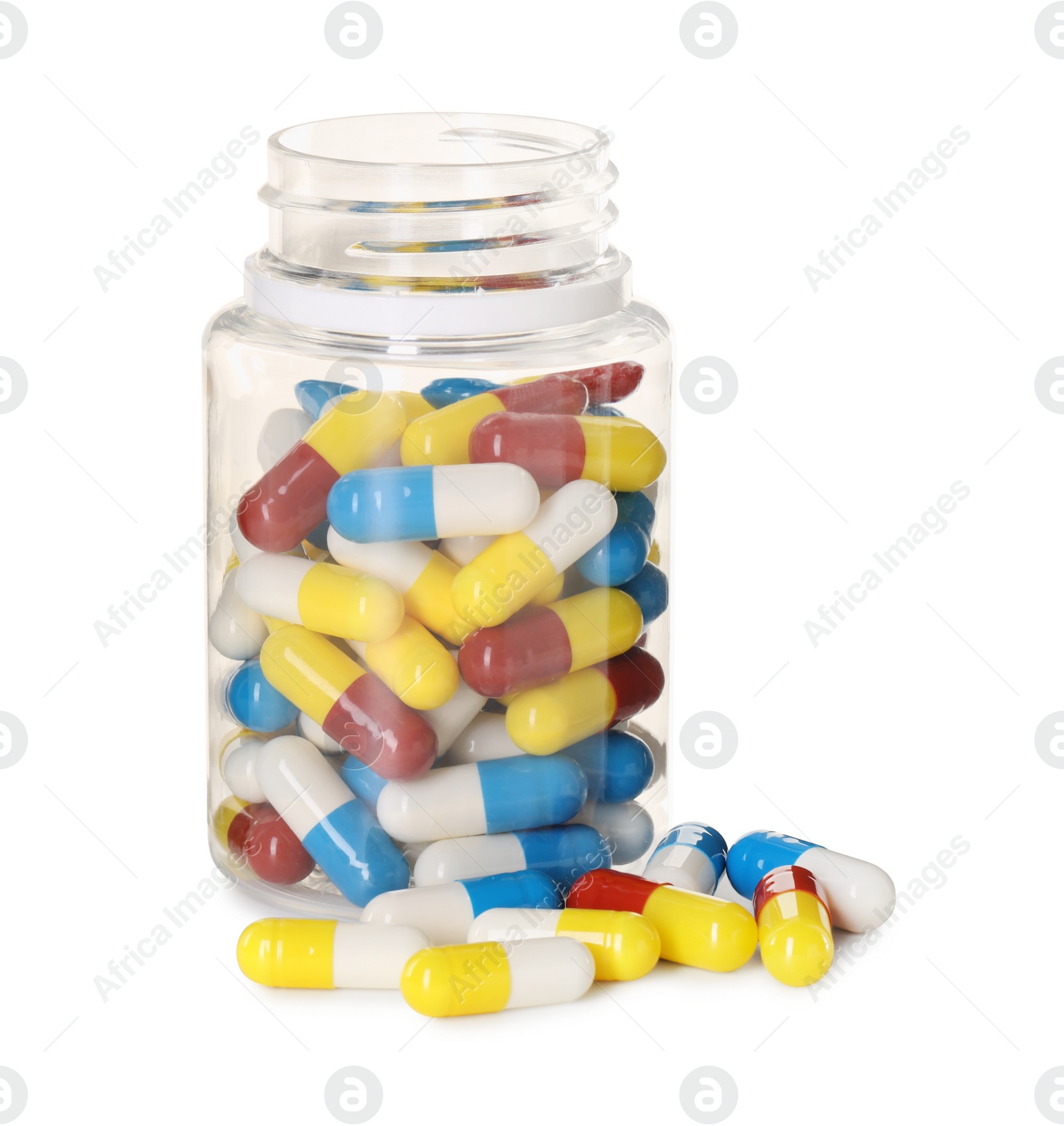 Photo of Antibiotic pills and bottle isolated on white