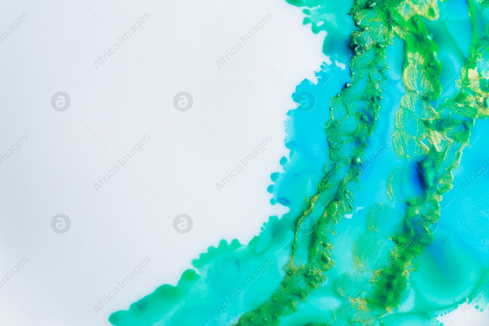 Photo of Beautiful abstract ink painting on white paper, closeup