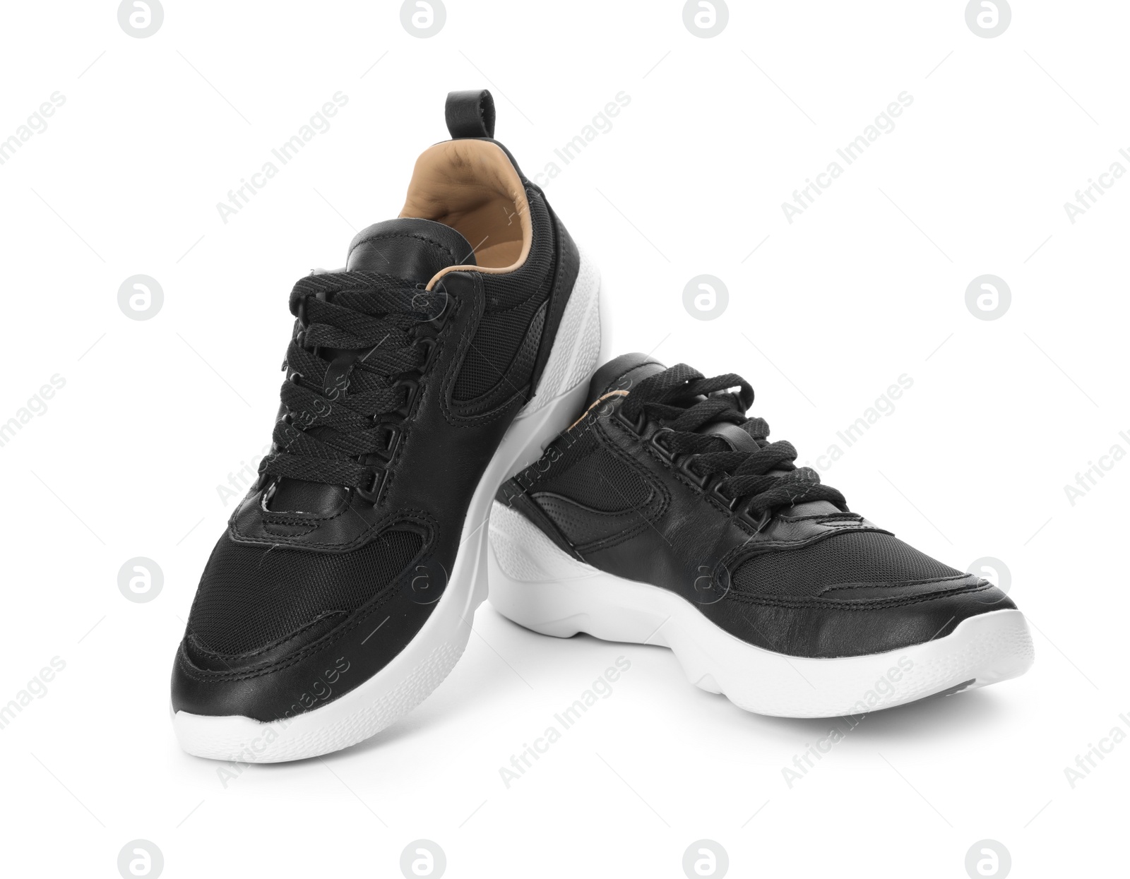 Photo of Pair of stylish shoes on white background