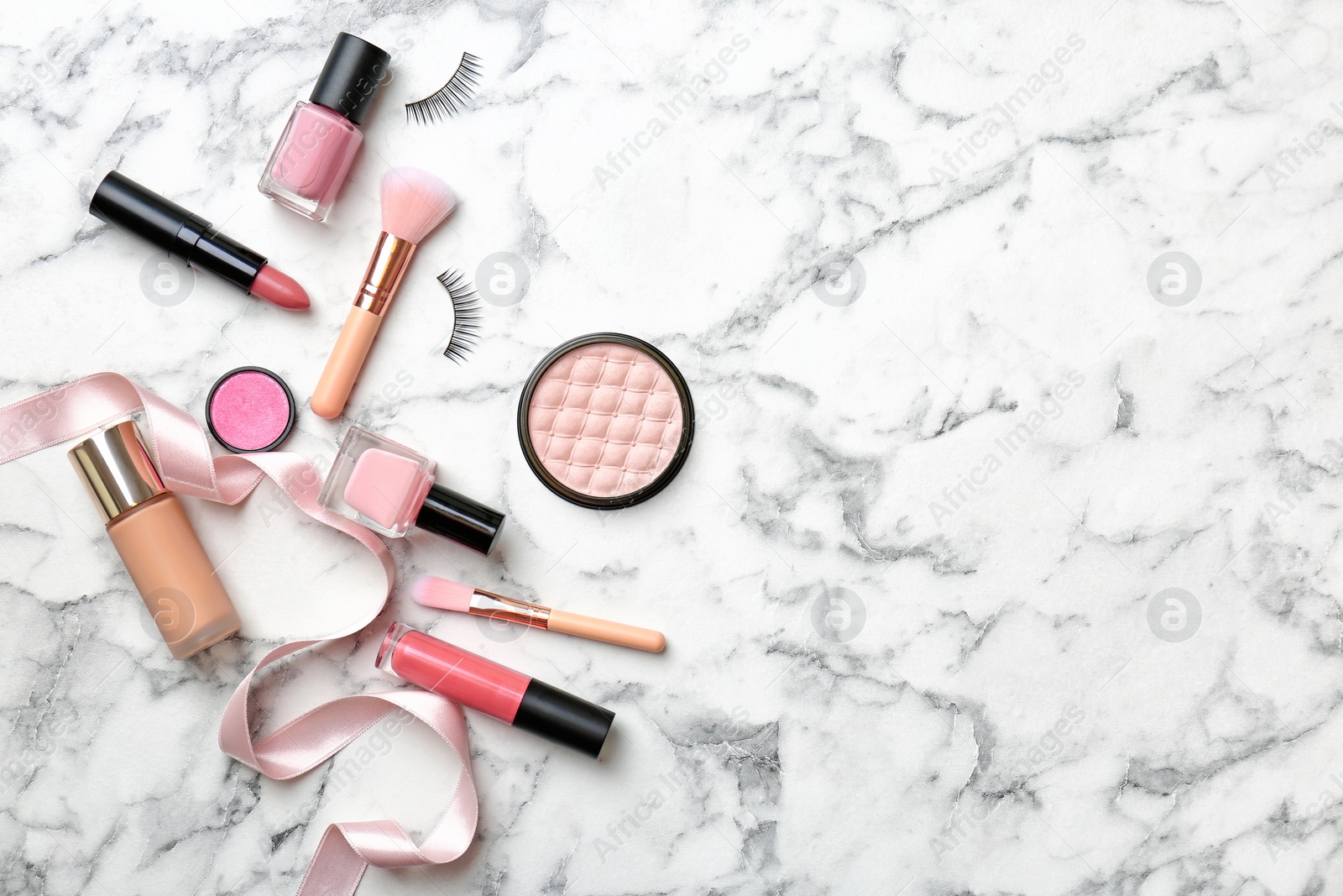 Photo of Flat lay composition with cosmetic products on light background