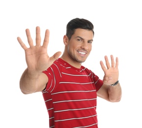 Man showing number nine with his hands on white background