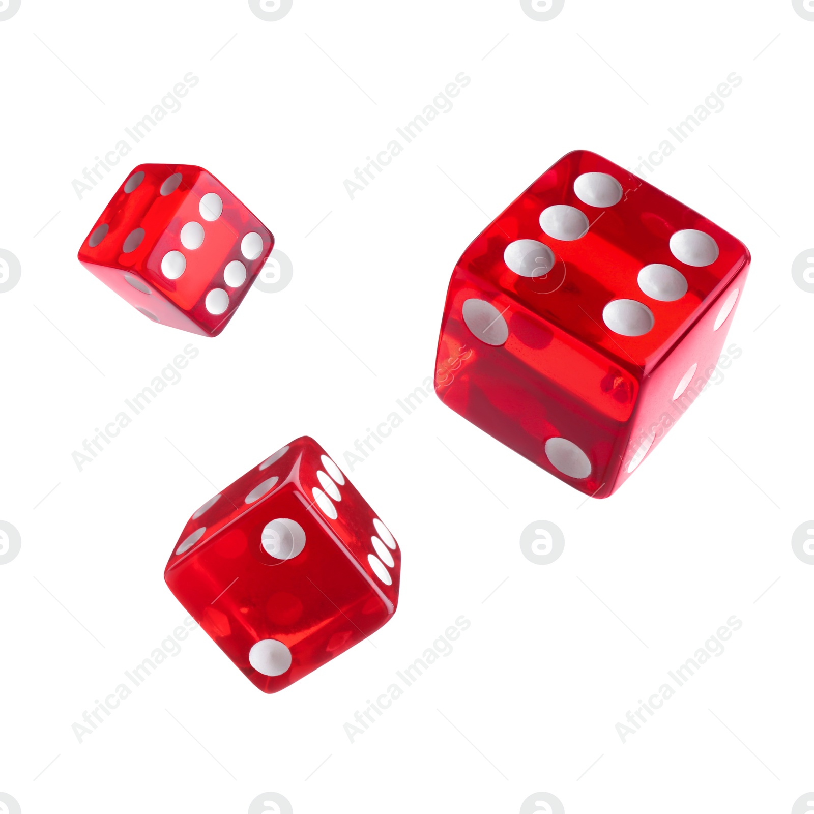 Image of Three red dice in air on white background