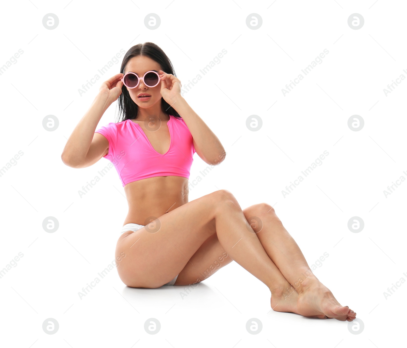 Photo of Beautiful young woman in stylish bikini with sunglasses on white background