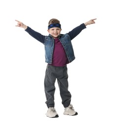 Photo of Happy little boy dancing on white background