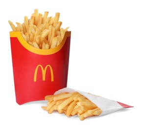 Photo of MYKOLAIV, UKRAINE - AUGUST 11, 2021: Big and small portions of McDonald's French fries on white background