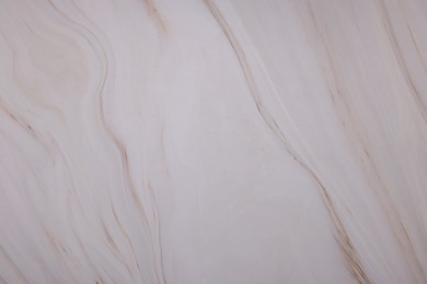 Photo of Texture of marble surface as background, closeup