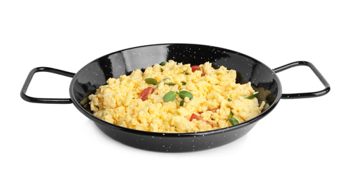 Photo of Tasty scrambled eggs with sprouts and cherry tomato in wok pan isolated on white