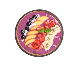 Healthy breakfast with delicious acai smoothie and fruits in bowl isolated on white, top view