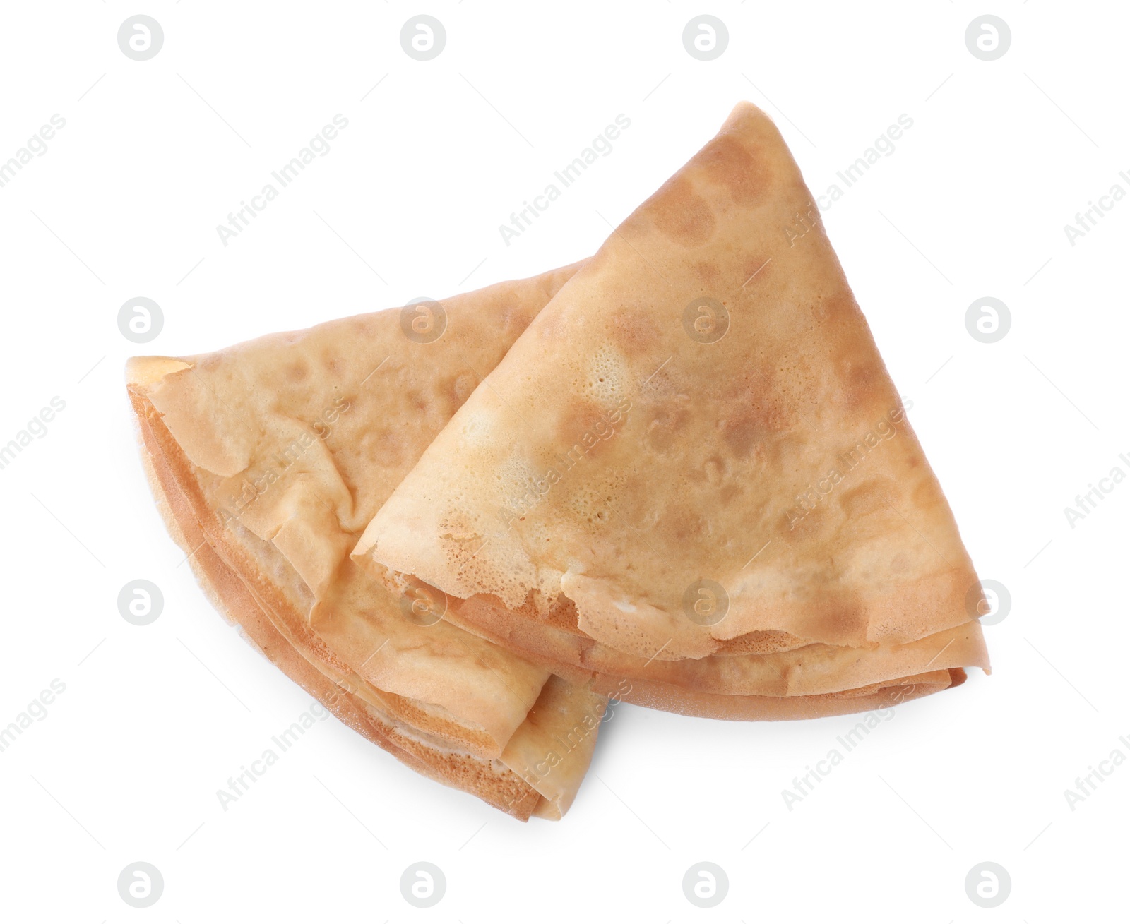 Photo of Delicious folded crepes on white background, top view