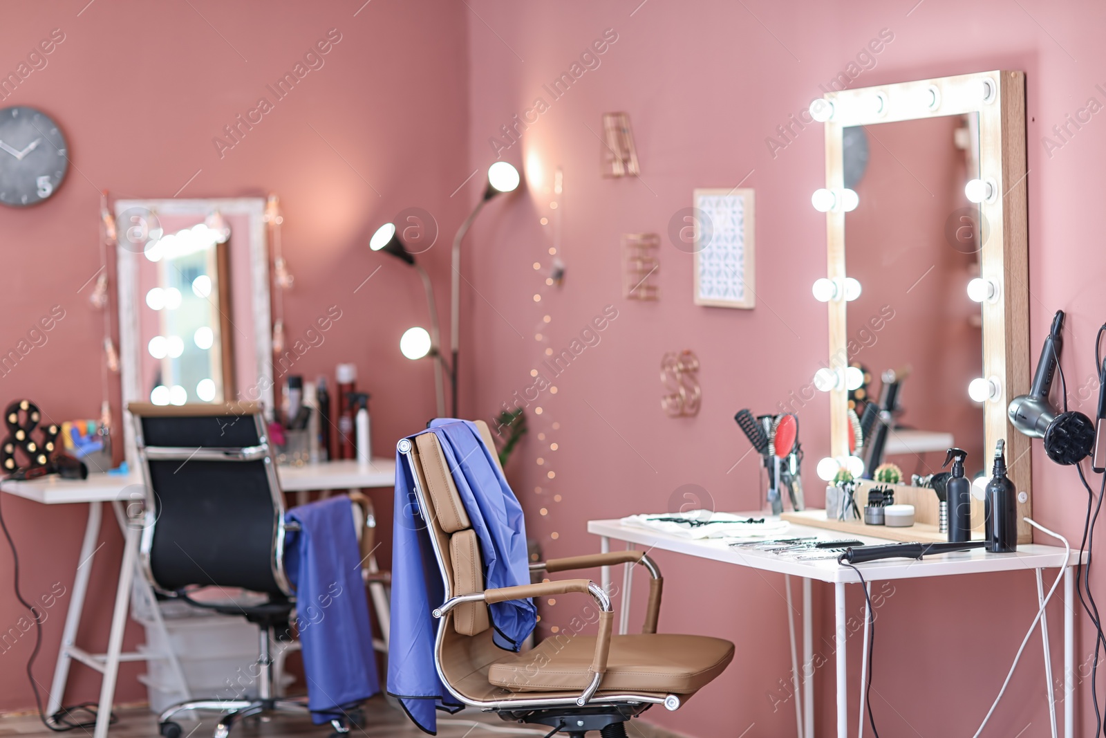 Photo of Modern interior of hairdressing salon