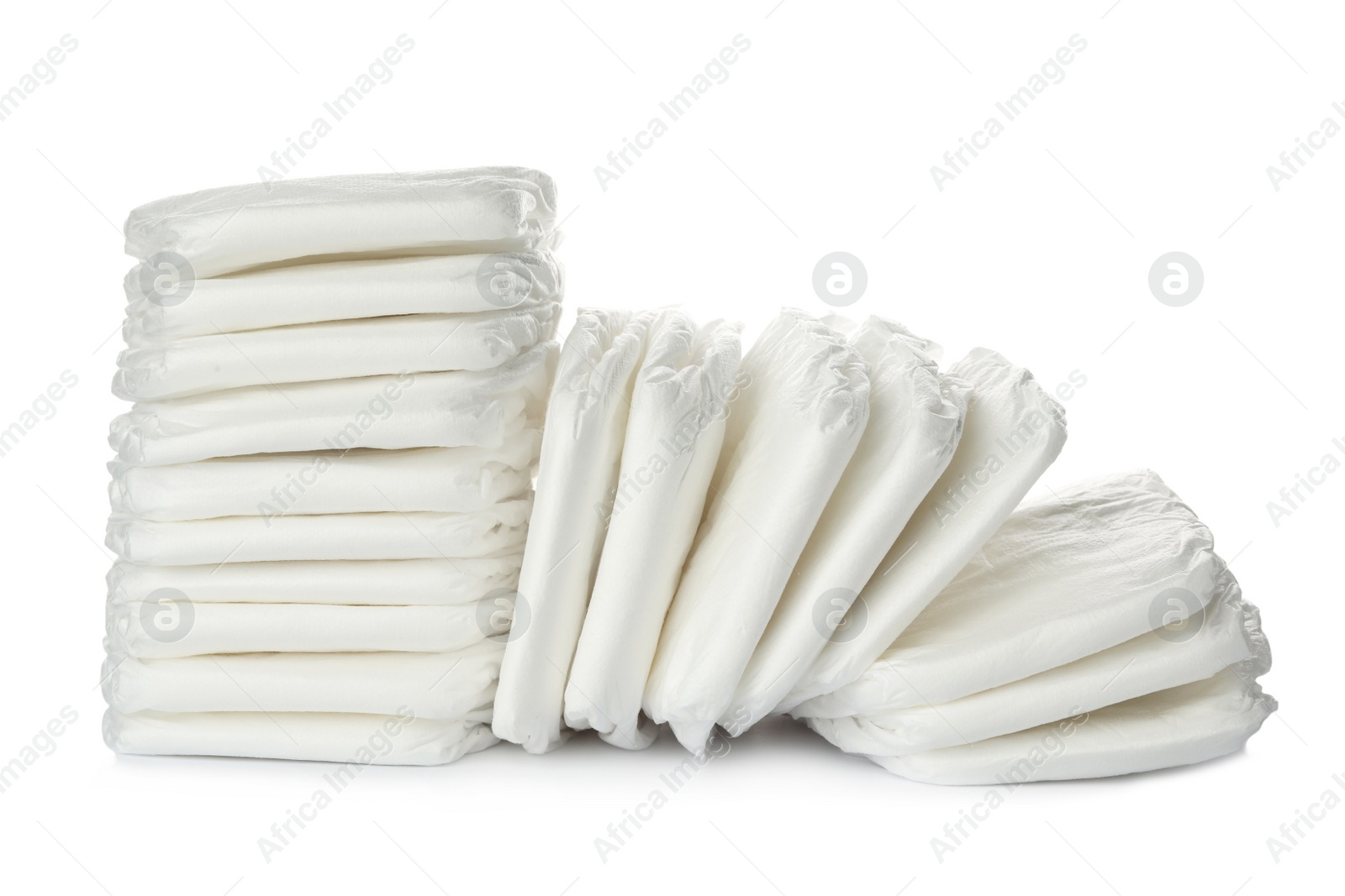 Photo of Pile of baby diapers isolated on white