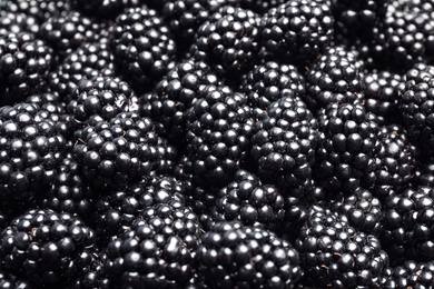 Tasty ripe fresh blackberries as background, closeup