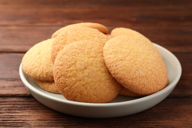 Delicious Danish butter cookies on wooden table, closeup